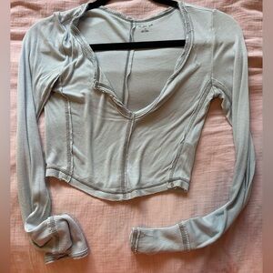 Urban Outfitters out from under light blue long sleeve